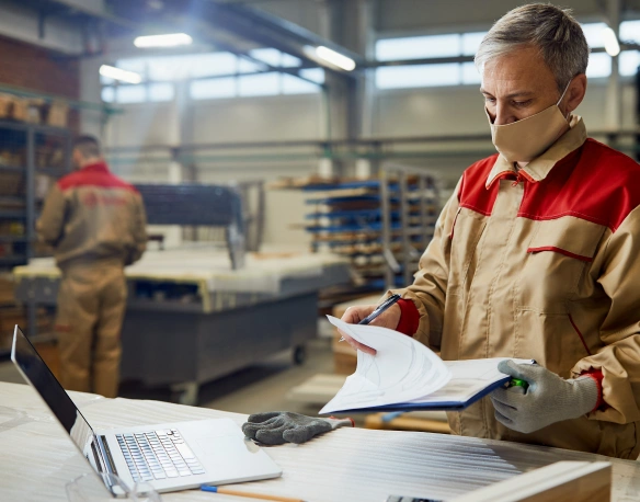Finance professional reviewing a real-time multi-currency ERP financial dashboard
