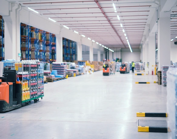 Factory floor supervisor reviewing an ERP production planning